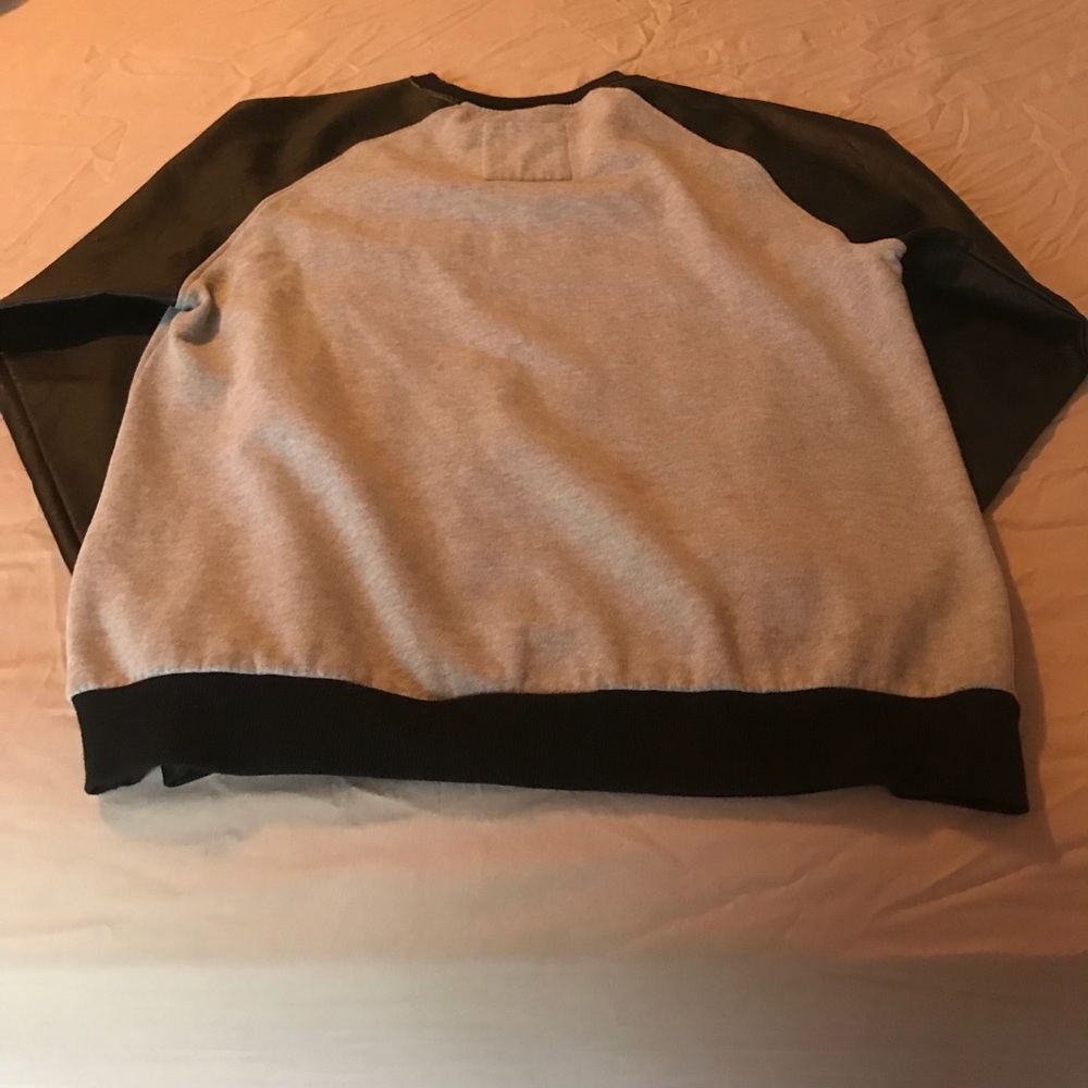 Sweatshirt-worn twice-still in perfect condition.